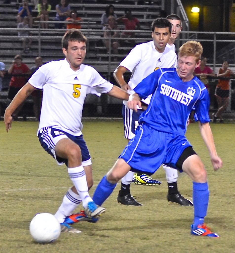 Gulf Coast's Steven Harshbarger (5) gets crossed up with a Southwest player Sept. 15.