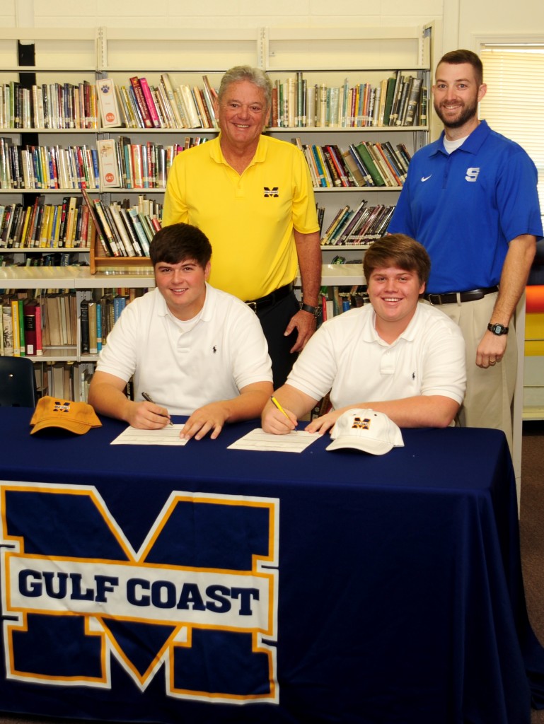 MGCCC golf team signees Fant Carpenter (sitting, left) & Brandon Robertson with MGCCC golf coach Tommy Snell (left standing) and Stone High coach Neal Lawler.