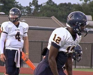 MGCCC QB Colton Kane (left) and WR Dhaquille Williams set up for a play during a scrimmage Aug. 22.