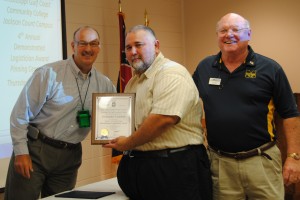 Christopher Cazaubon received the Outstanding Logistician Award from SOLE and MGCCC for 2013. Cazaubon, center, is pictured with Mike Salvetti, SOLE chapter president, left, and John O’Hara, Logistics instructor at MGCCC.