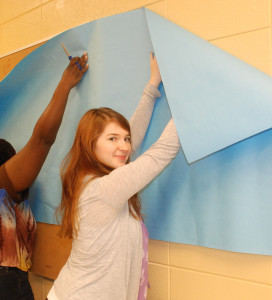 Courtney Everman, 18, of Diamondhead, works on a bulletin board in her Early Childhood Education Technology class at Mississippi Gulf Coast Community College’s Transitions Academy in Long Beach.  Classes began on August 21, with 24 students who are earning their GED and getting 15 hours of college credit in either Early Childhood Education or Welding during the one-semester academy.  Students who graduate will not only receive their GED, but certifications in the college program along with the college credit, so they can either continue college or get a job immediately.